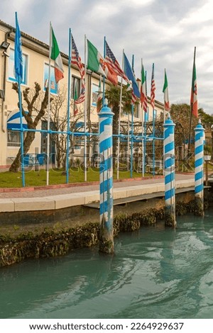 Italy and Usa Flags at Poles Murano Island Venetian Lagoon