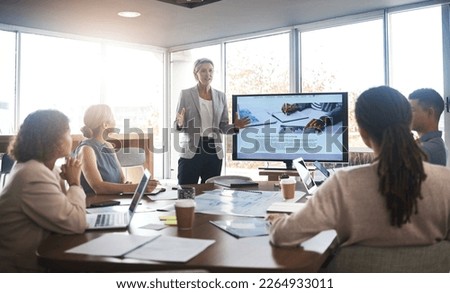 Business leader, woman and slideshow at team building seminar for company growth. Working, market research data and workshop of a female manager meeting with marketing group in office with tech Royalty-Free Stock Photo #2264933011