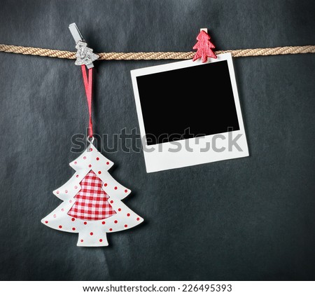 Christmas tree and an old picture frame on a black background