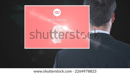 Composition of businessman and screen with biometric fingerprint. global online identity and digital interface concept digitally generated image.