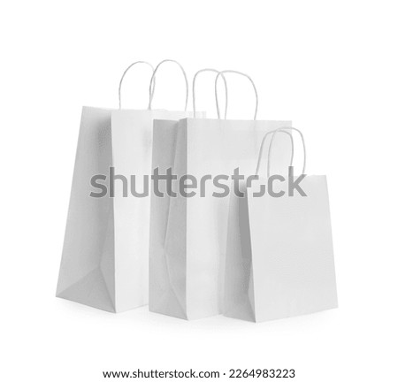 Blank paper bags on white background. Mockup for design