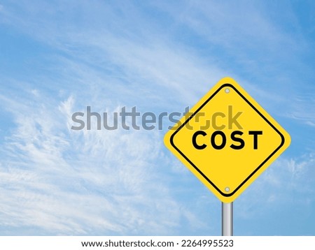 Yellow transportation sign with word cost on blue color sky background