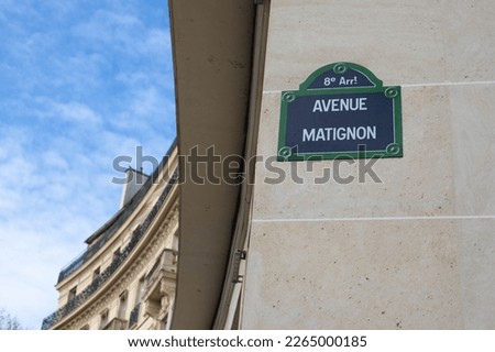 street sign indicating avenue Matignon, famous place in Paris
