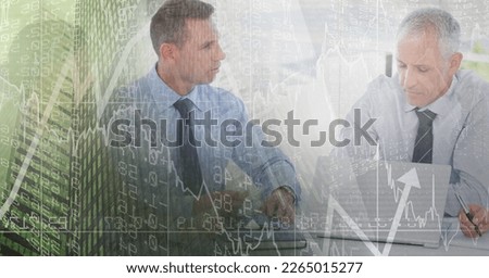 Composition of happy diverse business team in meeting over interface with graph. global business communication and digital interface concept digitally generated image.