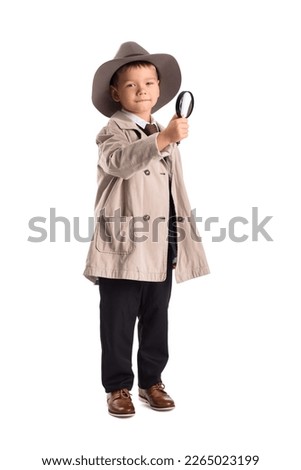 Cute little detective with magnifier on white background