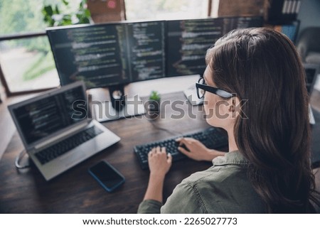 Photo of successful professional it specialist working ukrainian sites establishes reliable protection safety indoor room workstation