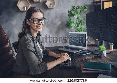Profile side photo of smiling adorable lady software hardware expert sit work place create site interface search bugs indoor workstation