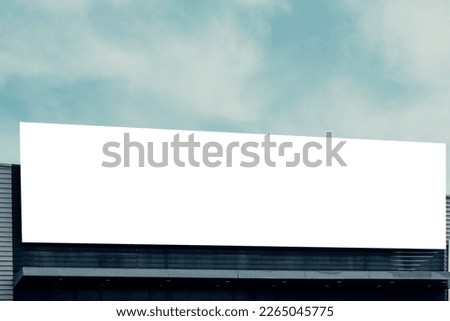 Blank white big mockup advertising sign on store, shop, shopping mall building. Empty banner mock up template outdoors