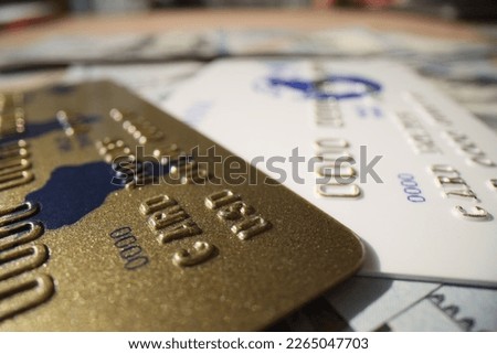 Banking plastic gold and platinum credit card, close-up. Entrepreneurial activity, credit and deposit