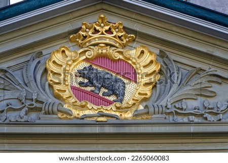 Coat of arms of City and Canton Bern at former monastery building at the old town on a sunny winter day. Photo taken February 21st, 2023, Bern, Switzerland.