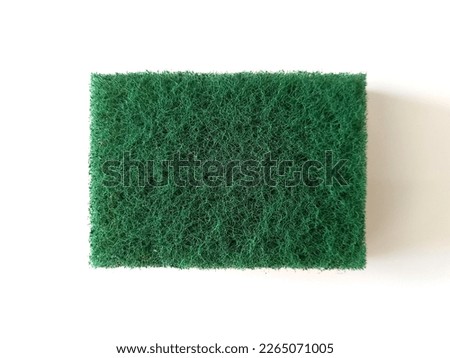 Aerial view Dishwashing sponge isolated on white background. Sponge scourer health care for cleaning dish and glass on white background. Washing sponge Close up. Royalty-Free Stock Photo #2265071005