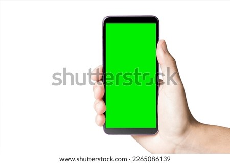 Hand holding smartphone with green screen. Mobile phone with chroma key. smartphone concept. app concept.