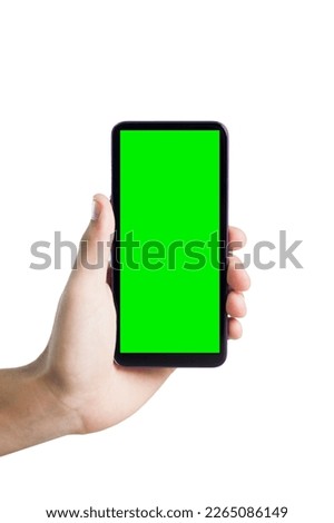 Hand holding smartphone with green screen. Mobile phone with chroma key. smartphone concept. app concept.
