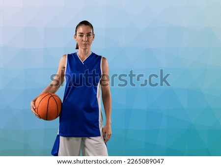Composition of portrait of female basketball player with ball and copy space on blue background. sport and competition concept digitally generated image.