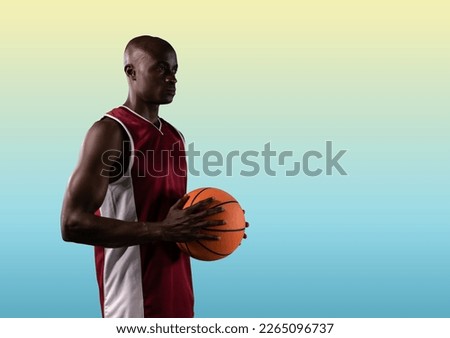 Composition of african american male basketball player with ball and copy space in background. sport and competition concept digitally generated image.