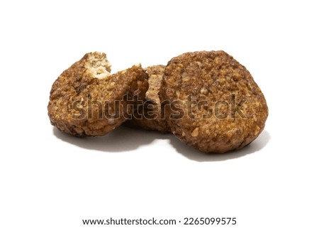 Frikadellen (squashed meatballs) isolated on a white background. German food concept.