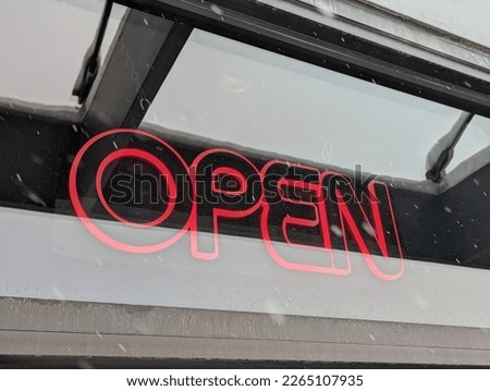 Electric Open sign in a shop window. 