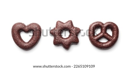 Sweet chocolate heart, star and pretzel isolated on the white background. Royalty-Free Stock Photo #2265109109
