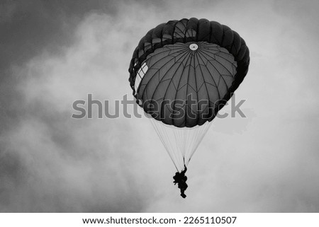 D-Day celebrations, parachutists, planes and Dakotas above Europe, France, Belgium, Great Britain and the Netherlands during the battle of Normandy (DDay, D'Day, World War II or 2 or Second World War) Royalty-Free Stock Photo #2265110507