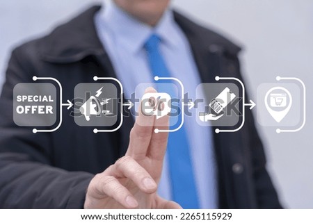 Businessman working on virtual touchscreen of future and sees abbreviation: SPECIAL OFFER. Discount sale concept. Special offer coupon promotion. Limited time special offer, hurry up. Royalty-Free Stock Photo #2265115929