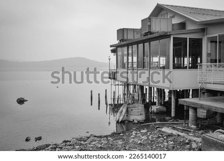 stilt house used as a tourist restaurant on the Viverone Lake shores; small lake of glacial origin, is located in Northern Italy, Piedmont Region.