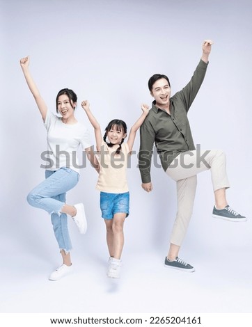Image of Asian family on background Royalty-Free Stock Photo #2265204161
