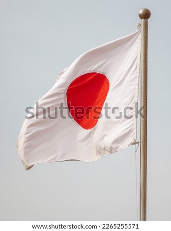 Flag of Japan against the sky. Symbol