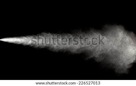Spraying of water in motion on black background