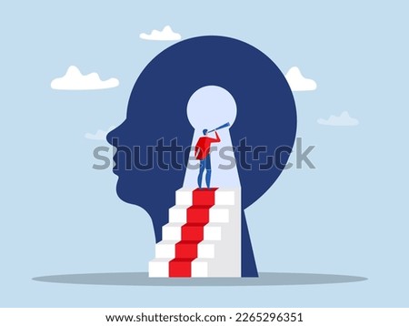 Business vision concept, businessman using telescope to look into the distance Self-discovery , Positive Psychology and Self Awareness Royalty-Free Stock Photo #2265296351
