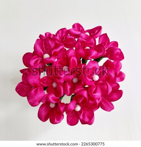 crafts from satin ribbons make flowers from fuschia color ribbons