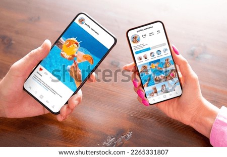 People viewing social media content on their phones Royalty-Free Stock Photo #2265331807
