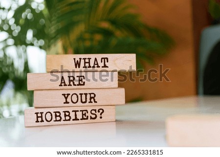 Wooden blocks with words 'What Are Your Hobbies?'. Royalty-Free Stock Photo #2265331815