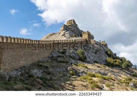 Genoese fortress in Sudak on the Crimean peninsula . Fortress wall . Royalty-Free Stock Photo #2265349437