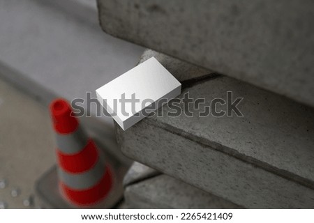 Business cards mockup template, urban concrete environment. Isolated surface to place your design. 