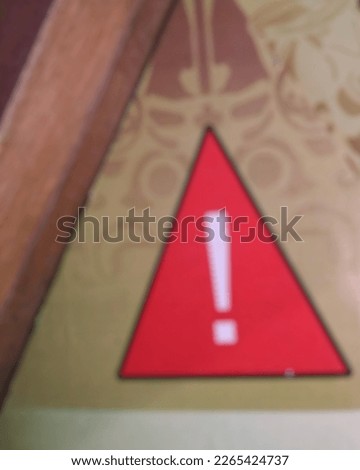 Blur of warning sign in triangle shape 