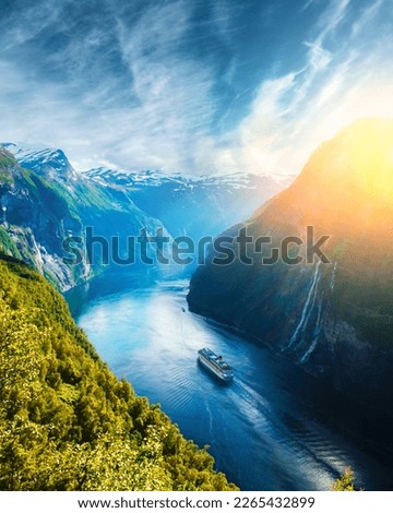Breathtaking view of Sunnylvsfjorden fjord and famous Seven Sisters waterfalls, near Geiranger village in western Norway. Royalty-Free Stock Photo #2265432899