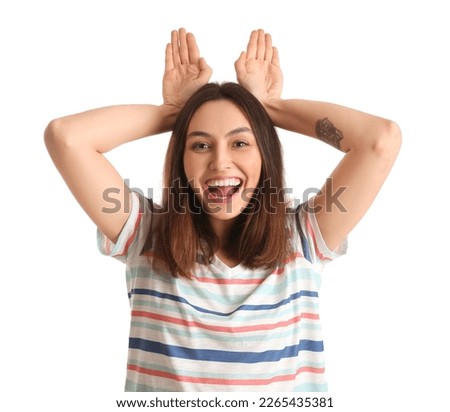 Funny young woman on white background