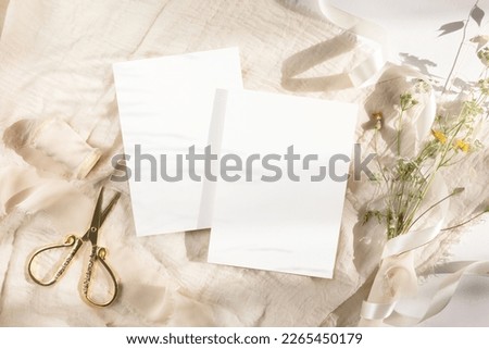 Two invitation cards with wild flowers and gold scissors Royalty-Free Stock Photo #2265450179