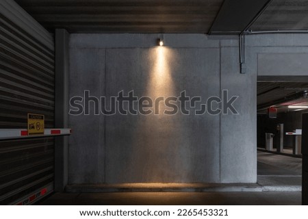 Blank wall mockup in the underground parking urban environment, empty space to display your advertising or branding campaign