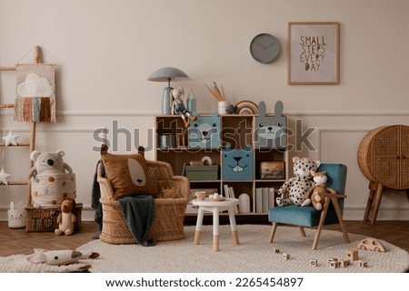 Creative composition of kids room interior with mock up poster frame, wall with stucco, colorful sideboard, braided armchair, plush toys, brown pillow and personal accessories. Home decor. Template.