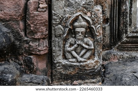 Ancient sandstone carvings in Prasat Hin Phimai Ancient Khmer castle Located in the historical park, Phimai District, Nakhon Ratchasima Province, Thailand Royalty-Free Stock Photo #2265460333