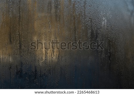 Condensation water drops on the window, wet glass Royalty-Free Stock Photo #2265468613