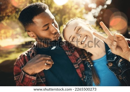 Couple, selfie peace sign and portrait smile outdoors, enjoying fun time and bonding at park. Interracial, love romance and black man and woman with v hand emoji for taking pictures for happy memory.
