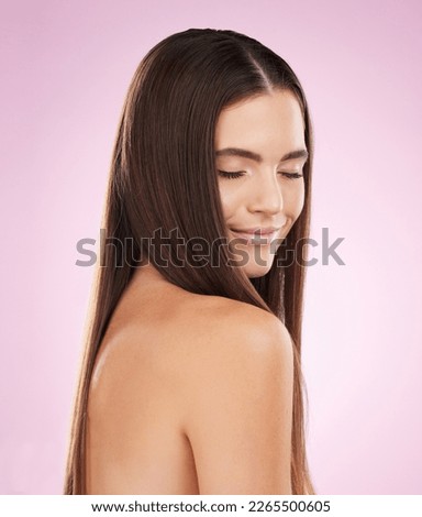 Hair, beauty and woman with haircare, face and skin glow with keratin treatment on pink background. Cosmetics shine, grooming and hairstyle, cosmetic care and female content with skincare and smile