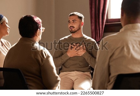 Support, trust and man sharing in group therapy with understanding, feelings and talking in session. Mental health, addiction or depression, men and women with therapist sitting together for healing. Royalty-Free Stock Photo #2265500827