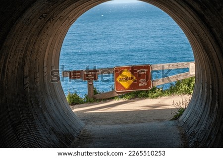Entrance to McWay Falls and Big Sur coast south of Monterey during spring in California, USA