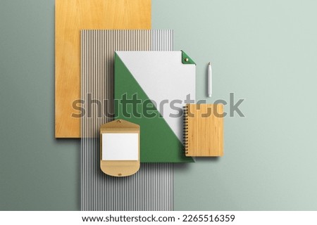 Branding stationery clean mockup template, with reeded glass and wooden elements, real photo, business card, envelope, folder. Blank isolated on a green background to place your design.