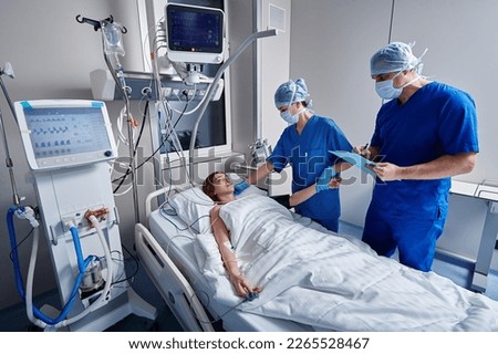 Cardiac monitoring on stroke female patient hospitalized in intensive care unit. Neurovascular unit Royalty-Free Stock Photo #2265528467