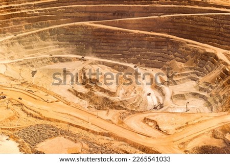Close-up aerial view of the pit of a copper mine at the altiplano of the Atacama Desert in northern Chile
