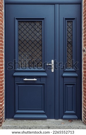 blue color front door isolated ,close-up .Beautiful blue color front door Royalty-Free Stock Photo #2265552713